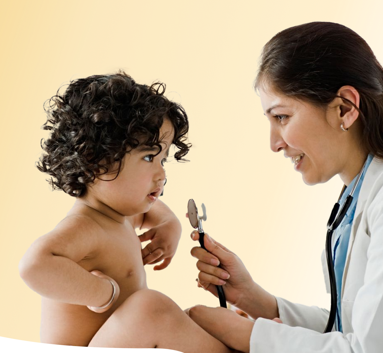 Pediatrician examining a child before vaccination